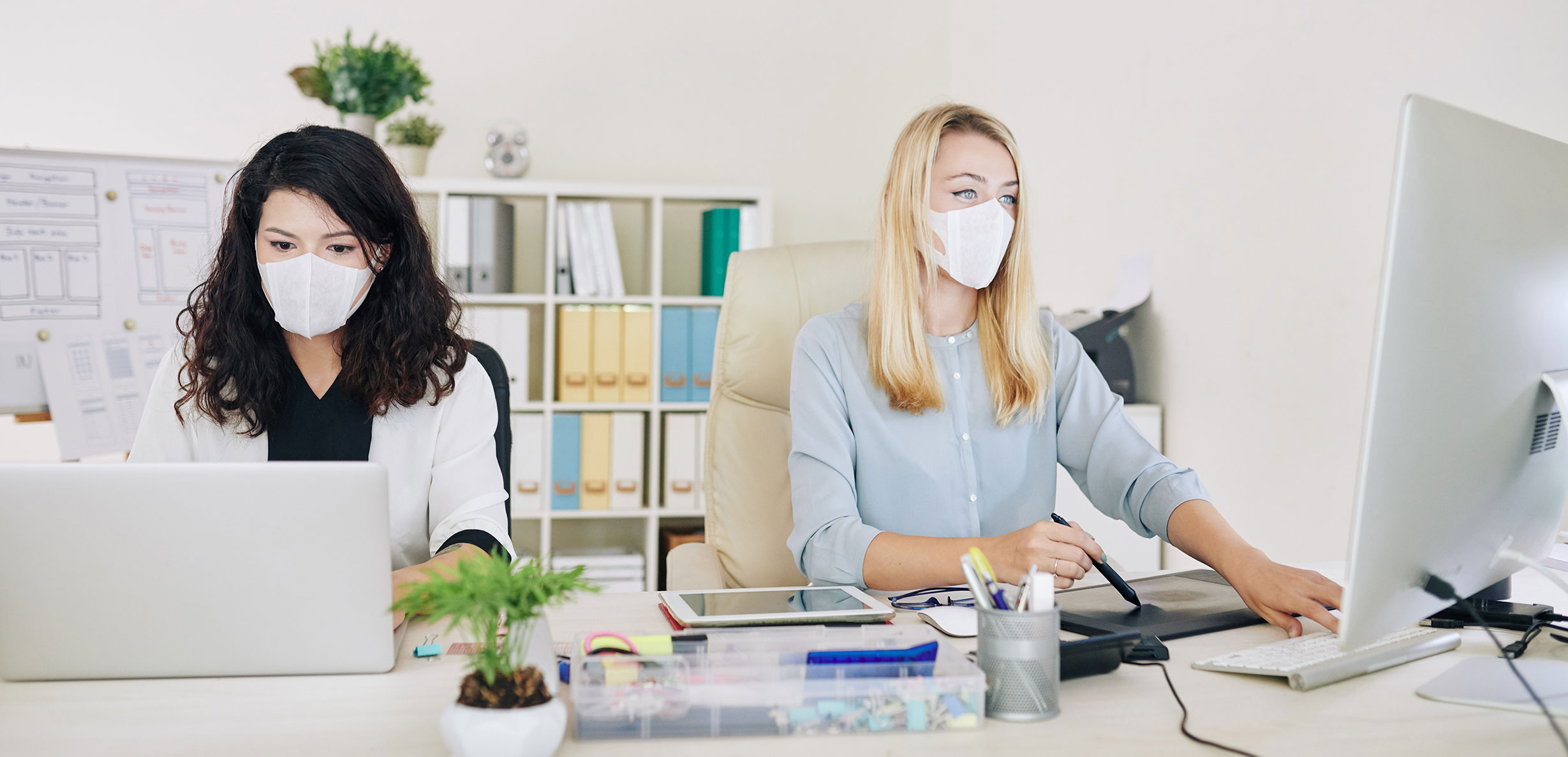 People Working in an Office with Masks