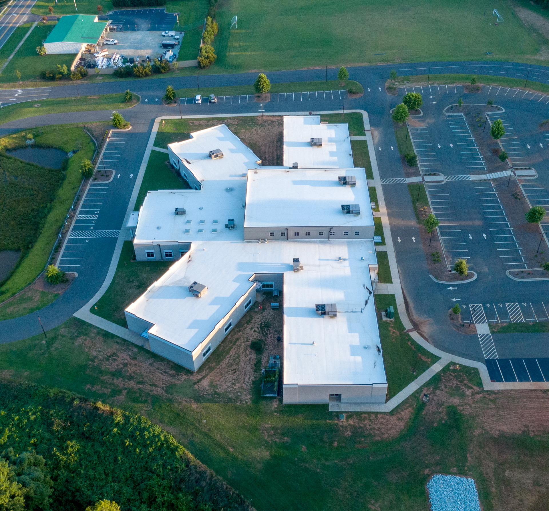 Aerial photograph of the Eno River Academy from the side.