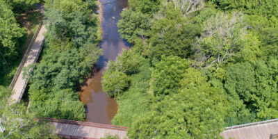 Town of Hillsborough Riverwalk showing it crossing water.