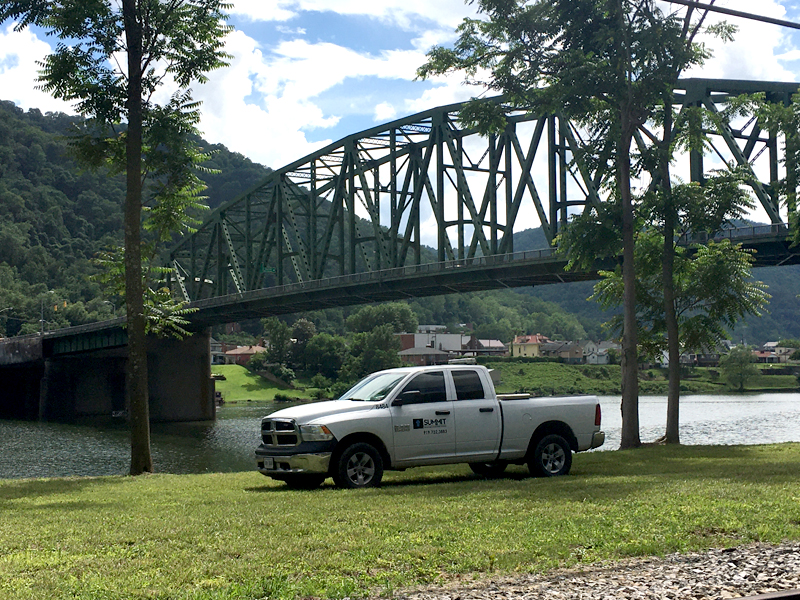 Summit truck sitting in front of the Earl M. Vickers Memorial Bridge.