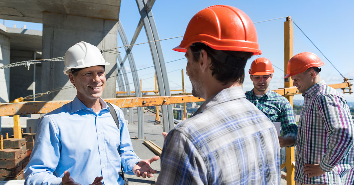 People Talking on a Construction Site