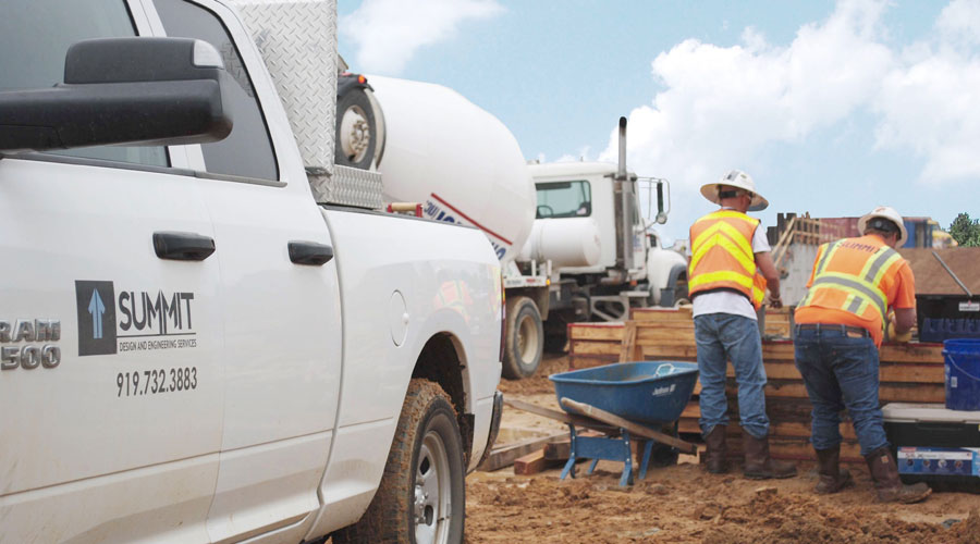 Employees Testing Construction Materials on a Project Site