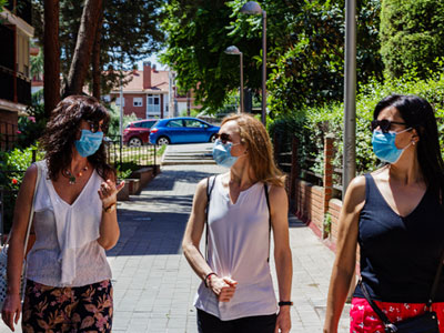 Women Walking with Masks On