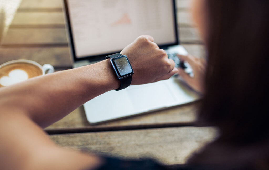 Person Looking at Smart Watch