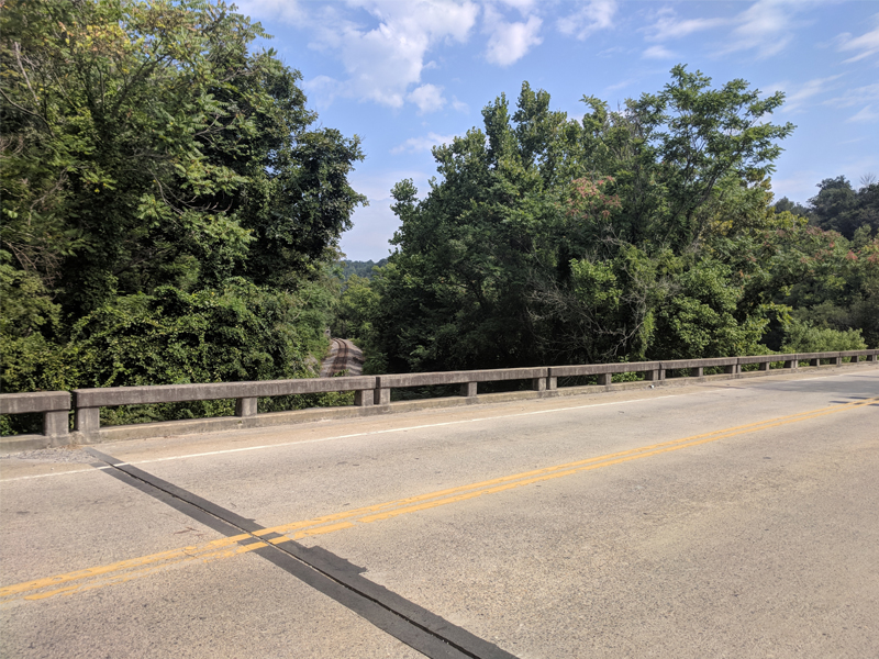 B-5992 Bridge over French Broad River depicting the roadside surface of the bridge.