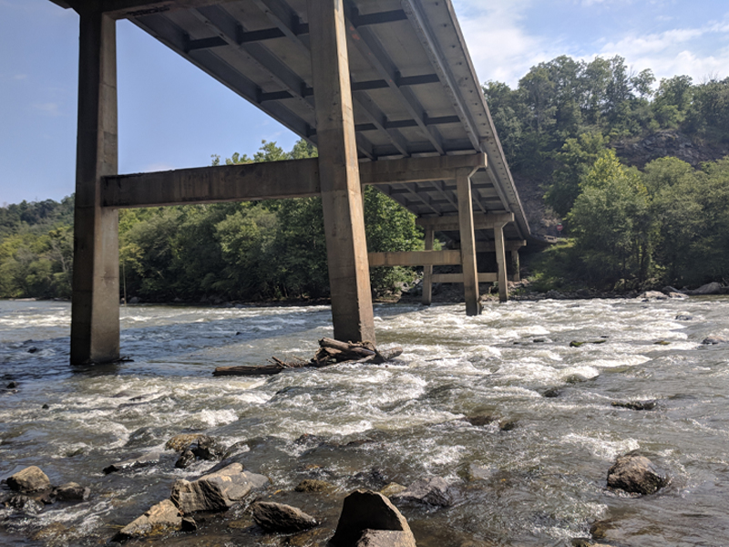 B-5992 Bridge over French Broad River length shot of bridge over the water.