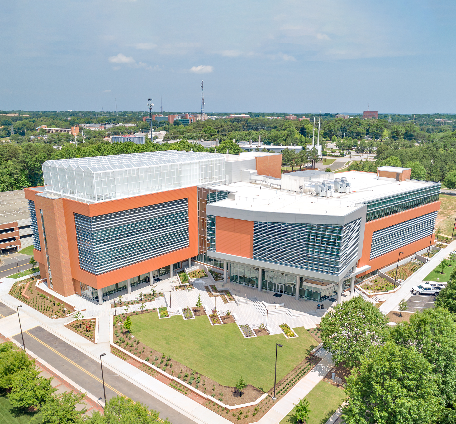 NCSU Plant Sciences Building showing the landscape and greenery around the building.