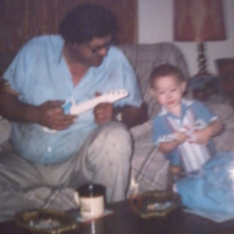 Wes C. and his grandfather playing on their "instruments" together while Wes was a small child.